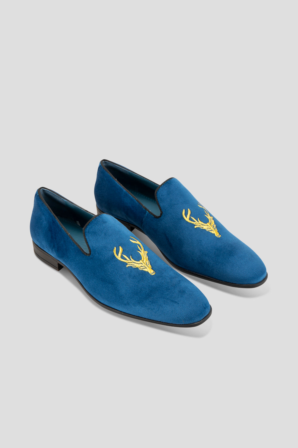 Blue and gold store loafers